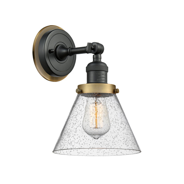Cone Sconce shown in the Matte Black finish with a Seedy shade