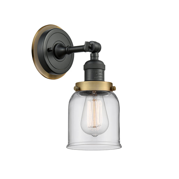 Bell Sconce shown in the Matte Black finish with a Clear shade