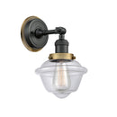 Oxford Sconce shown in the Matte Black finish with a Clear shade