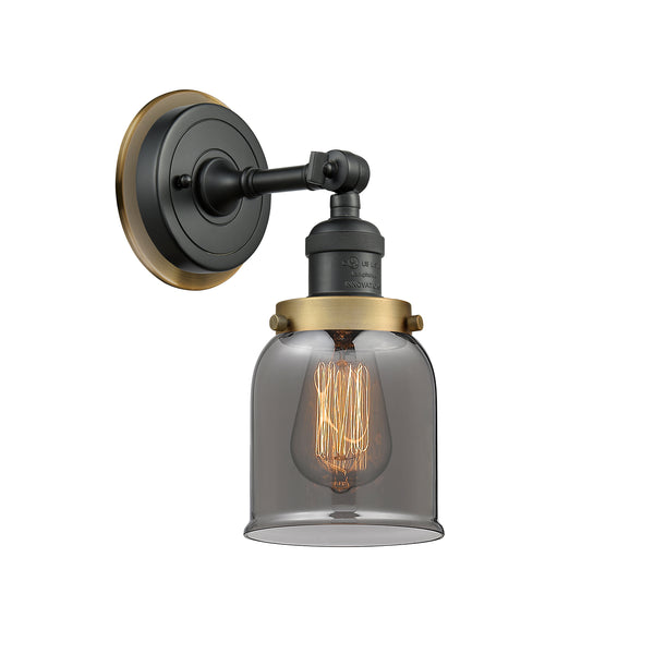 Bell Sconce shown in the Matte Black finish with a Plated Smoke shade