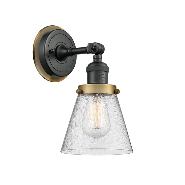 Cone Sconce shown in the Matte Black finish with a Seedy shade