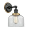 Bell Sconce shown in the Matte Black finish with a Clear shade