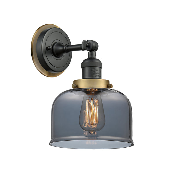 Bell Sconce shown in the Matte Black finish with a Plated Smoke shade