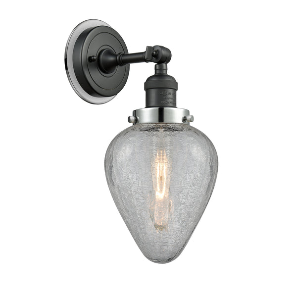 Geneseo Sconce shown in the Matte Black finish with a Clear Crackled shade