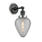 Geneseo Sconce shown in the Matte Black finish with a Clear Crackled shade