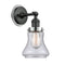 Bellmont Sconce shown in the Matte Black finish with a Seedy shade