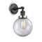 Beacon Sconce shown in the Matte Black finish with a Clear shade