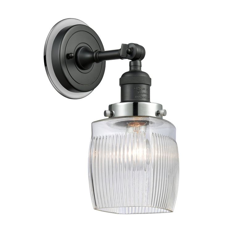 Colton Sconce shown in the Matte Black finish with a Clear Halophane shade