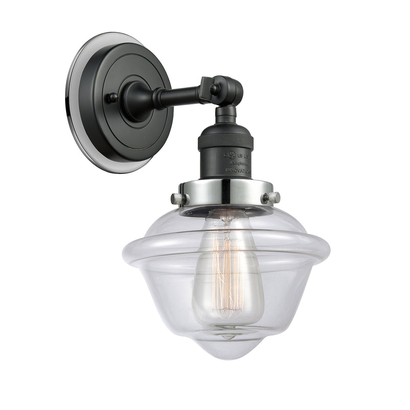 Oxford Sconce shown in the Matte Black finish with a Clear shade