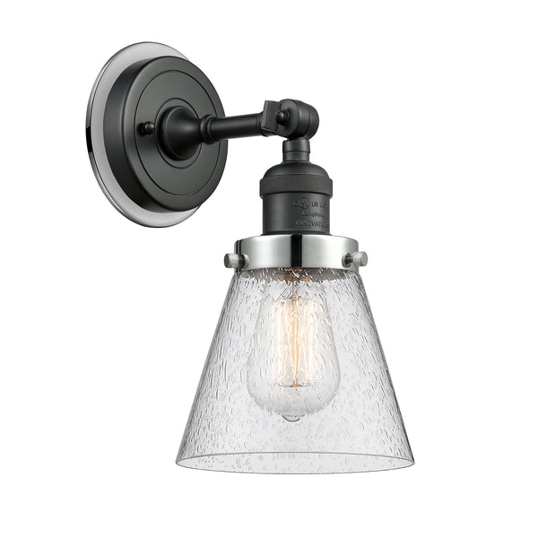 Cone Sconce shown in the Matte Black finish with a Seedy shade