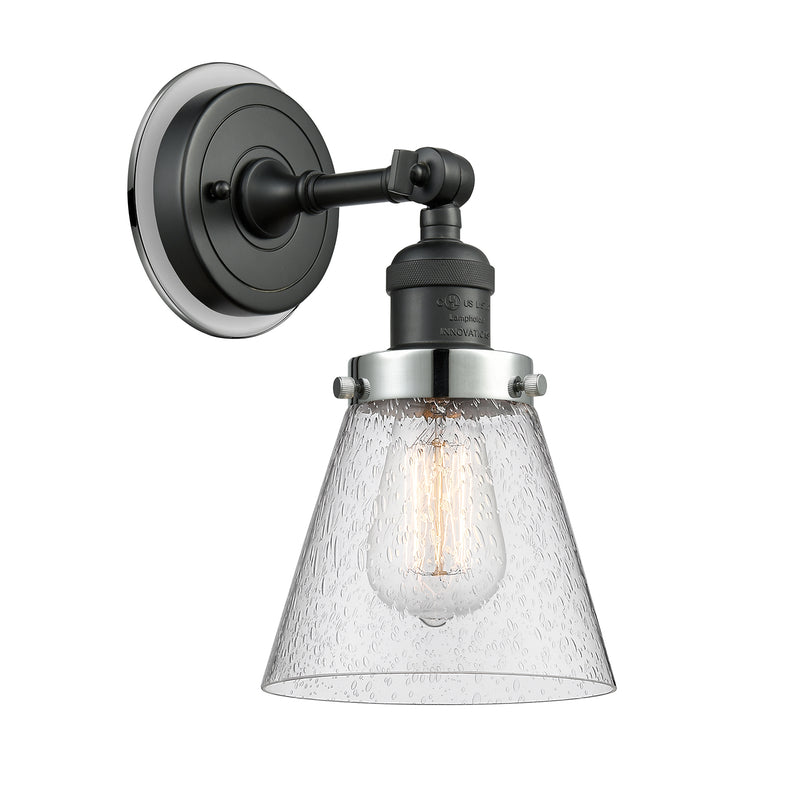 Cone Sconce shown in the Matte Black finish with a Seedy shade