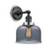 Bell Sconce shown in the Matte Black finish with a Plated Smoke shade