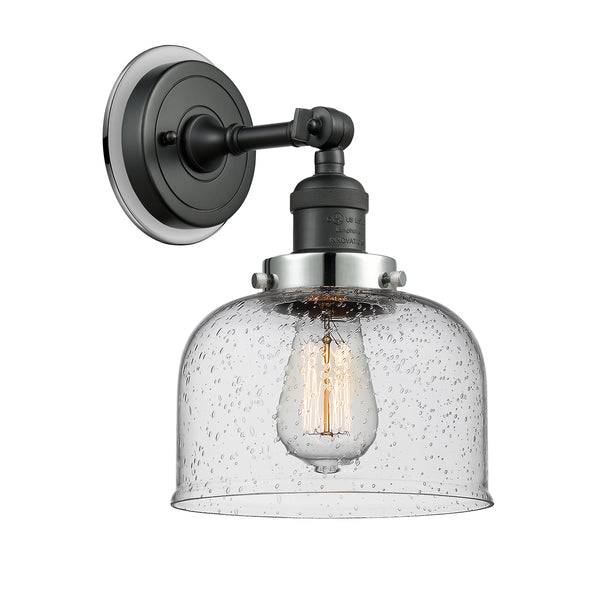Bell Sconce shown in the Matte Black finish with a Seedy shade