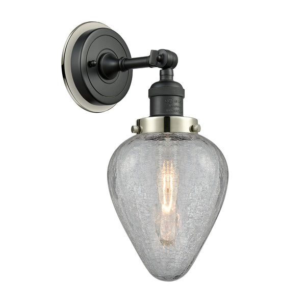 Geneseo Sconce shown in the Matte Black finish with a Clear Crackled shade