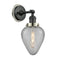Geneseo Sconce shown in the Matte Black finish with a Clear Crackled shade