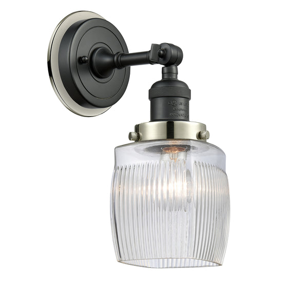 Colton Sconce shown in the Matte Black finish with a Clear Halophane shade