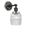Colton Sconce shown in the Matte Black finish with a Clear Halophane shade