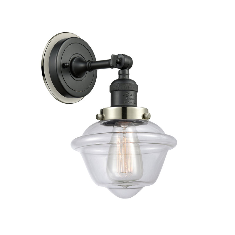 Oxford Sconce shown in the Matte Black finish with a Clear shade