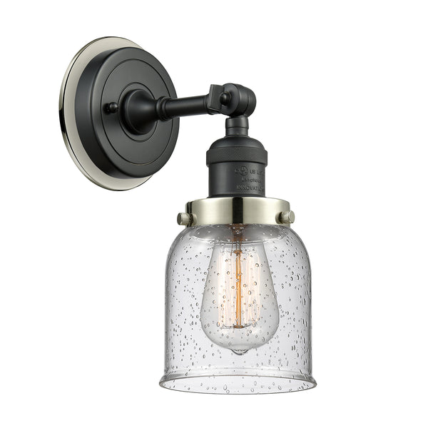 Bell Sconce shown in the Matte Black finish with a Seedy shade