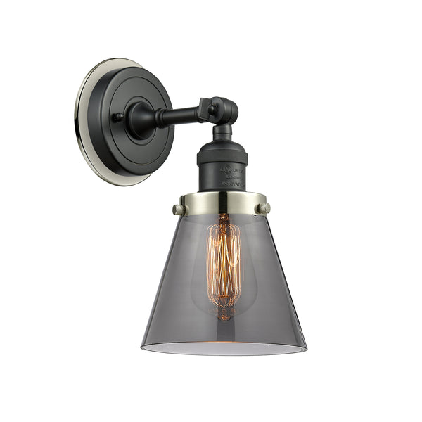 Cone Sconce shown in the Matte Black finish with a Plated Smoke shade