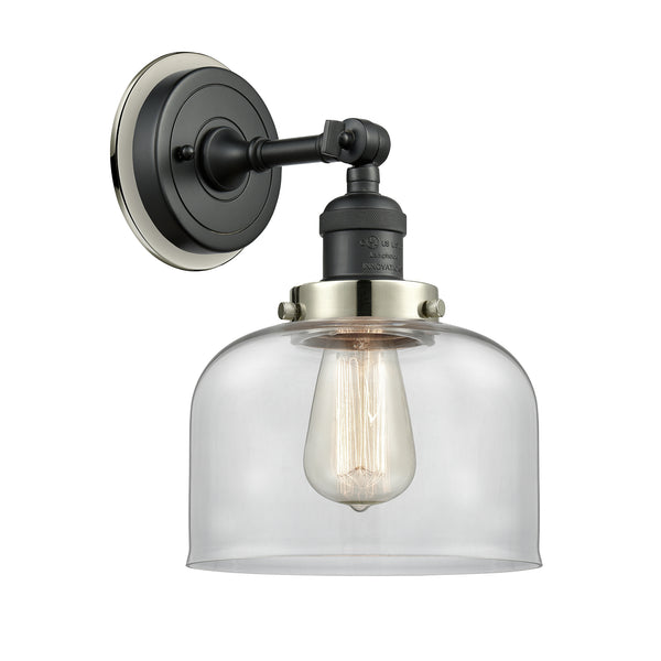 Bell Sconce shown in the Matte Black finish with a Clear shade