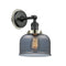 Bell Sconce shown in the Matte Black finish with a Plated Smoke shade