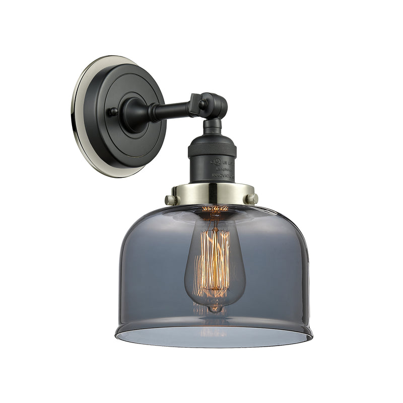 Bell Sconce shown in the Matte Black finish with a Plated Smoke shade