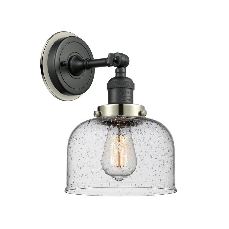 Bell Sconce shown in the Matte Black finish with a Seedy shade