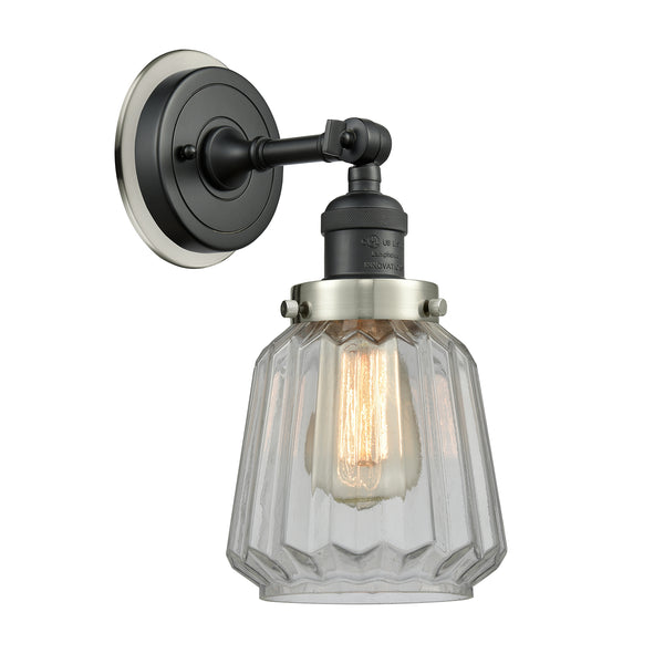 Chatham Sconce shown in the Matte Black finish with a Clear shade