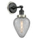 Geneseo Sconce shown in the Matte Black finish with a Clear Crackled shade