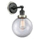 Beacon Sconce shown in the Matte Black finish with a Clear shade