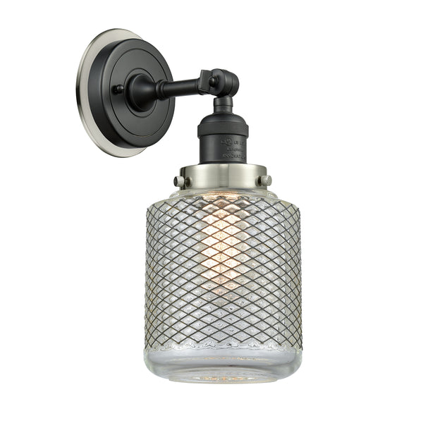 Stanton Sconce shown in the Matte Black finish with a Clear Wire Mesh shade