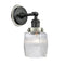 Colton Sconce shown in the Matte Black finish with a Clear Halophane shade