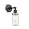 Dover Sconce shown in the Matte Black finish with a Seedy shade