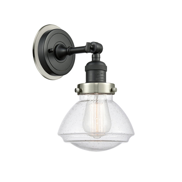 Olean Sconce shown in the Matte Black finish with a Seedy shade