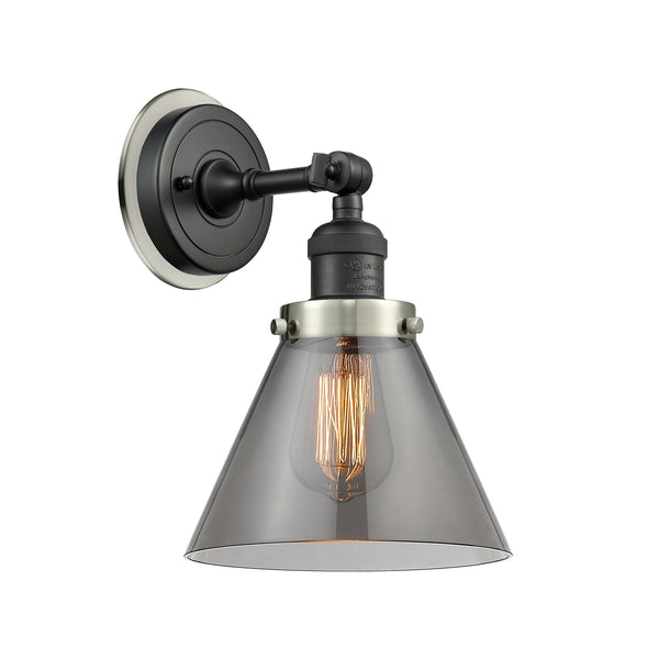 Cone Sconce shown in the Matte Black finish with a Plated Smoke shade