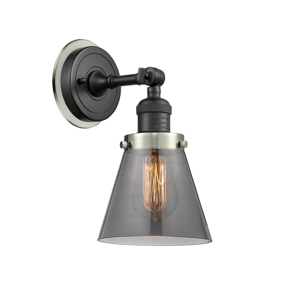 Cone Sconce shown in the Matte Black finish with a Plated Smoke shade