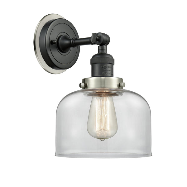 Bell Sconce shown in the Matte Black finish with a Clear shade
