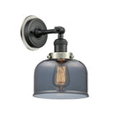 Bell Sconce shown in the Matte Black finish with a Plated Smoke shade