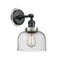 Bell Sconce shown in the Matte Black finish with a Seedy shade