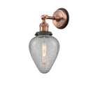 Geneseo Sconce shown in the Antique Copper finish with a Clear Crackled shade