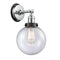 Beacon Sconce shown in the Polished Chrome finish with a Seedy shade