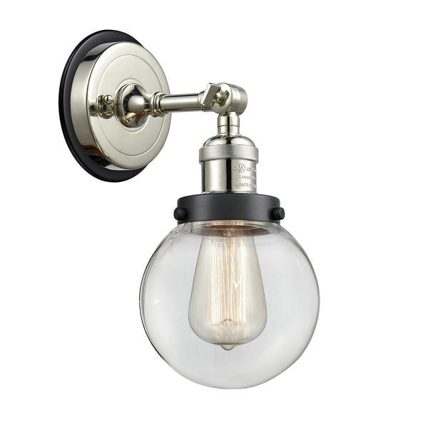 Beacon Sconce shown in the Polished Nickel finish with a Clear shade
