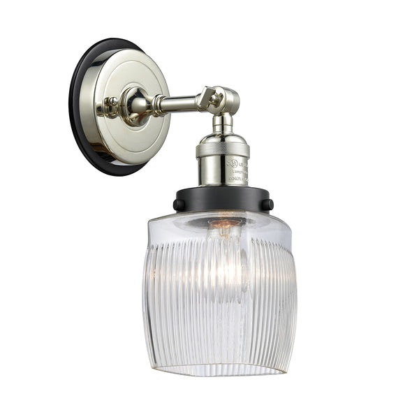 Colton Sconce shown in the Polished Nickel finish with a Clear Halophane shade