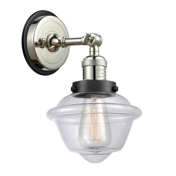 Oxford Sconce shown in the Polished Nickel finish with a Clear shade