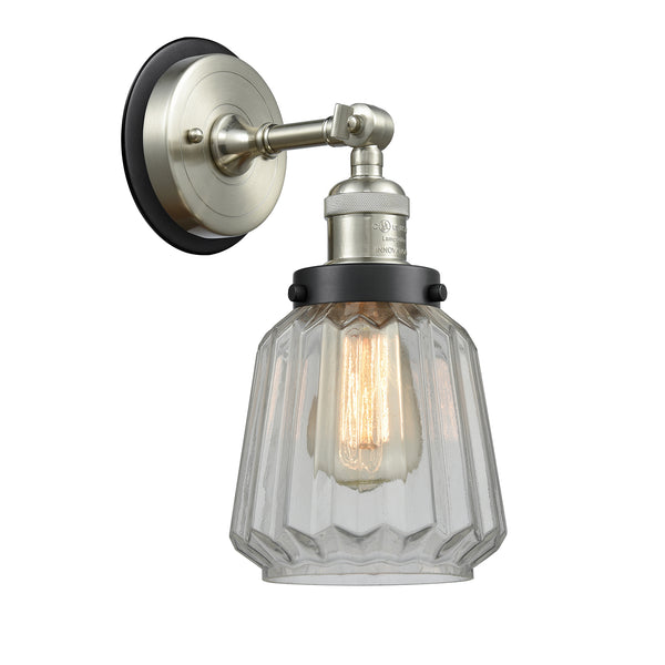 Chatham Sconce shown in the Brushed Satin Nickel finish with a Clear shade