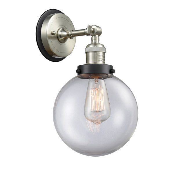 Beacon Sconce shown in the Brushed Satin Nickel finish with a Clear shade