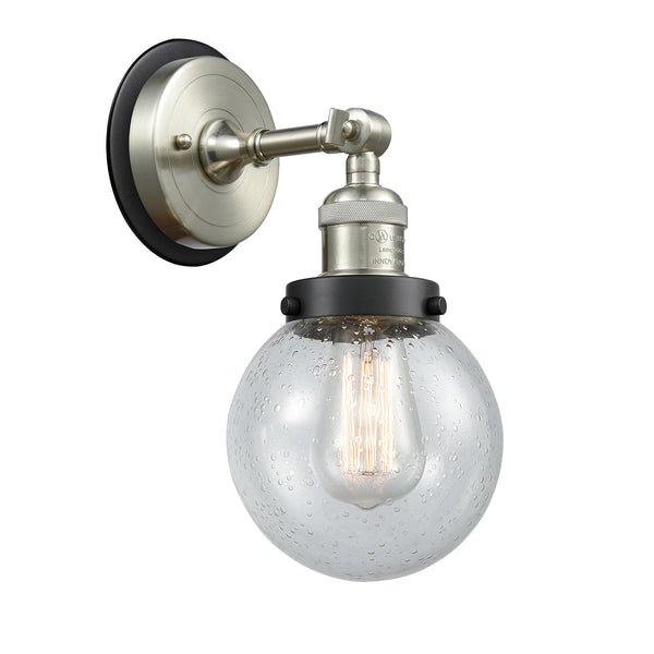 Beacon Sconce shown in the Brushed Satin Nickel finish with a Seedy shade