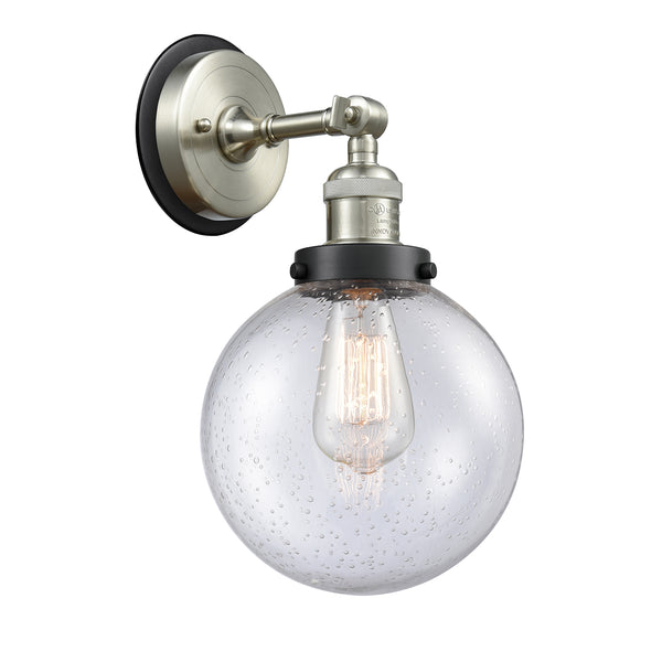 Beacon Sconce shown in the Brushed Satin Nickel finish with a Seedy shade