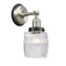 Colton Sconce shown in the Brushed Satin Nickel finish with a Clear Halophane shade